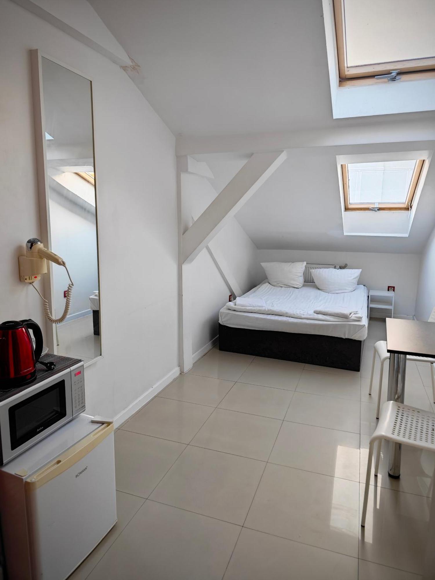 Apartamenty Hoza Attic Studio Warszawa Værelse billede